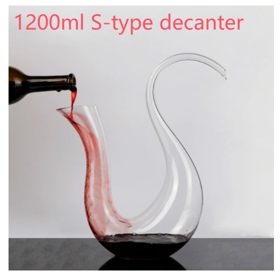 1200ml S-type decanter with red wine being poured into it on a gray background.