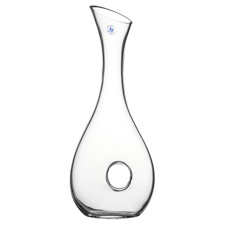 Clear glass decanter on a white background