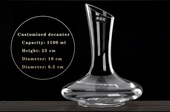 Clear glass decanter with dimensions on a black background