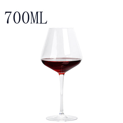 Wine glass with red wine and '700ML' text on a white background