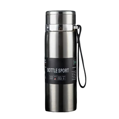 Silver insulated bottle with black label on a white background