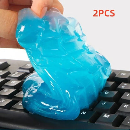 Blue stress ball held over a keyboard with '2PCS' text above