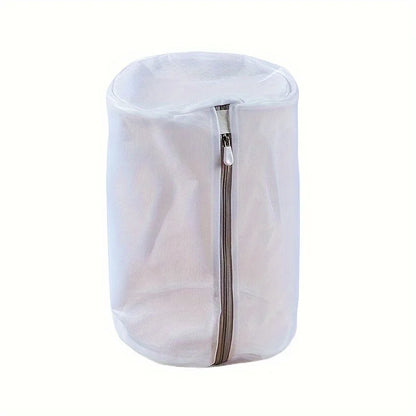 White mesh laundry bag with a zipper on a white background