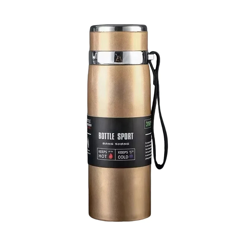 Gold insulated bottle with black label on a white background