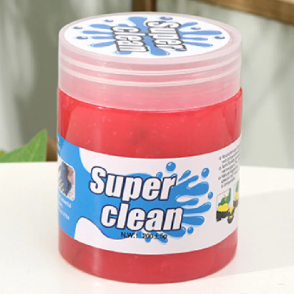 Red container labeled 'Super Clean' with a blue and white label on a white surface.