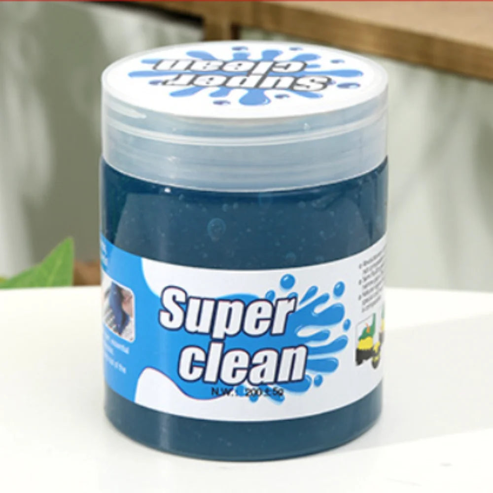 Container of 'Super Clean' product with a blue lid on a white surface.