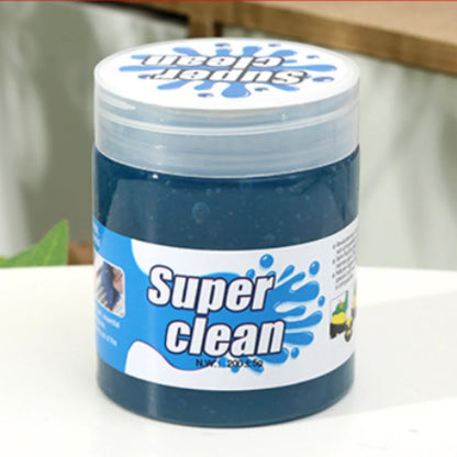 Container of 'Super Clean' product with a blue lid on a white surface.
