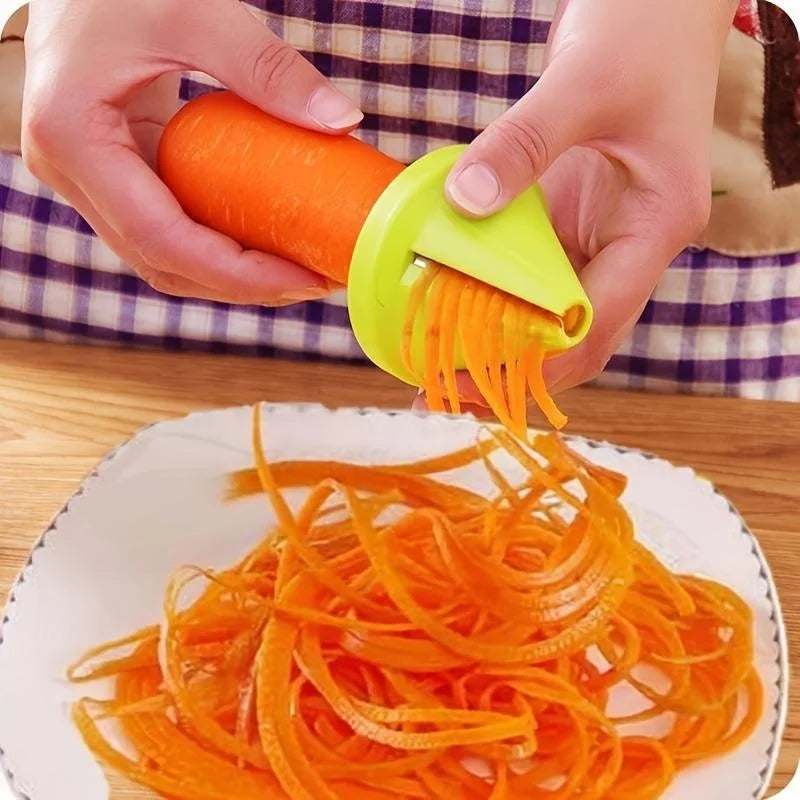 Person using a carrot peeler to create thin carrot strips on a white plate.