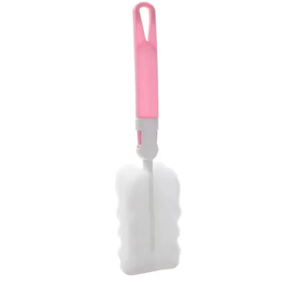 Cleaning brush with pink handle on a white background