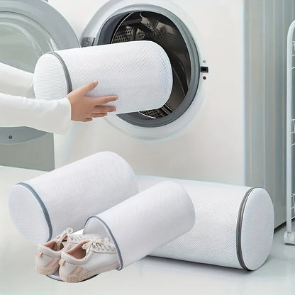Person using a shoe cleaning machine with a dryer in the background